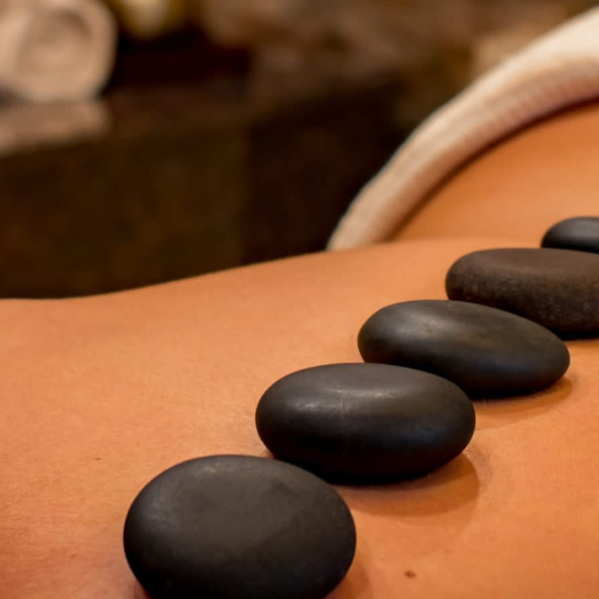 Massage aux pierres chaudes à Tassin-la-Demi-Lune